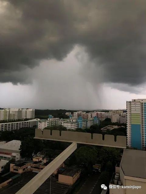 新加坡海天之間出現巨大”雨柱“